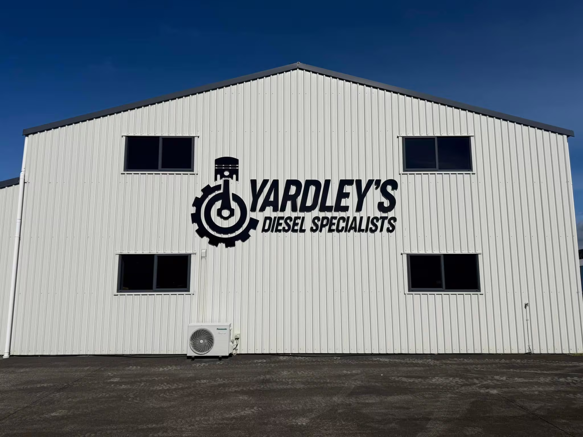 Large Yardley’s Diesel Specialists sign on the workshop wall